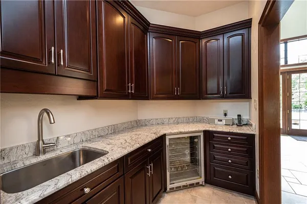a kitchen with a sink and cabinets