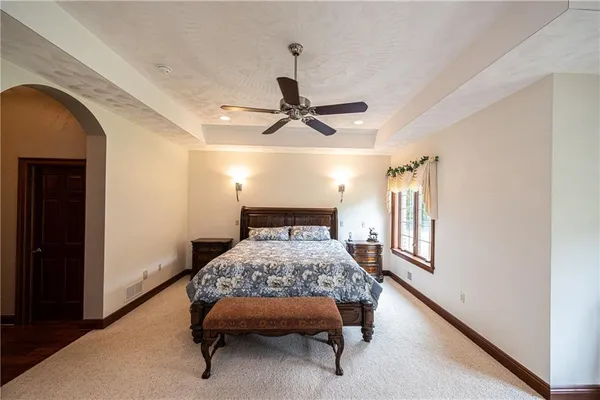 a bed room with a bed and a window