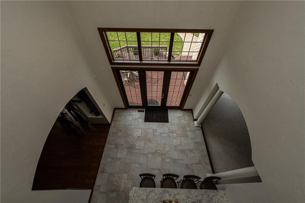 1801 Freeport Road Kittanning, PA 16201 - Photo 9 of 36 an entryway in a hall with wooden floor and a window