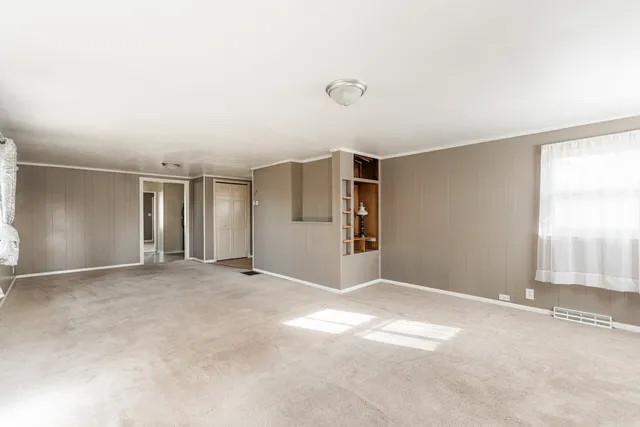 an empty room with windows