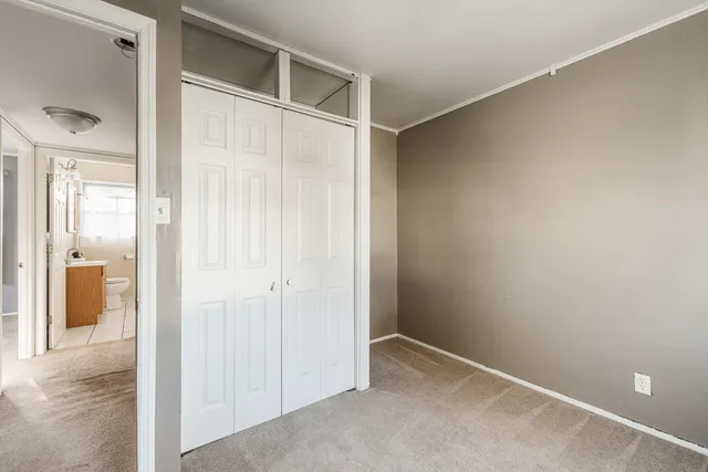 a bathroom with a sink a mirror and a toilet