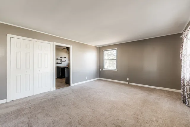 an empty room with windows