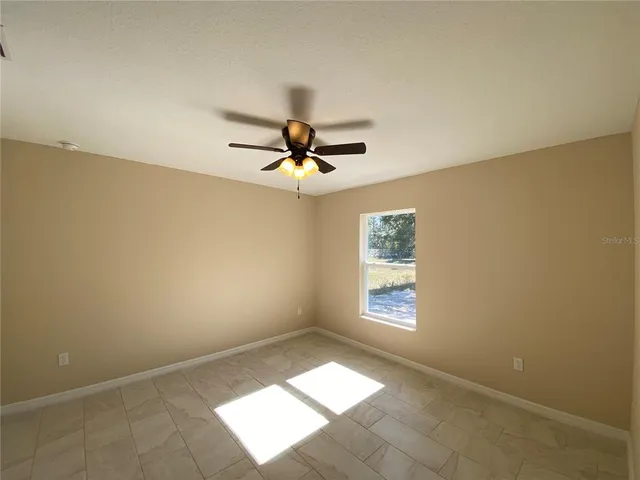 a view of a livingroom with wooden floor