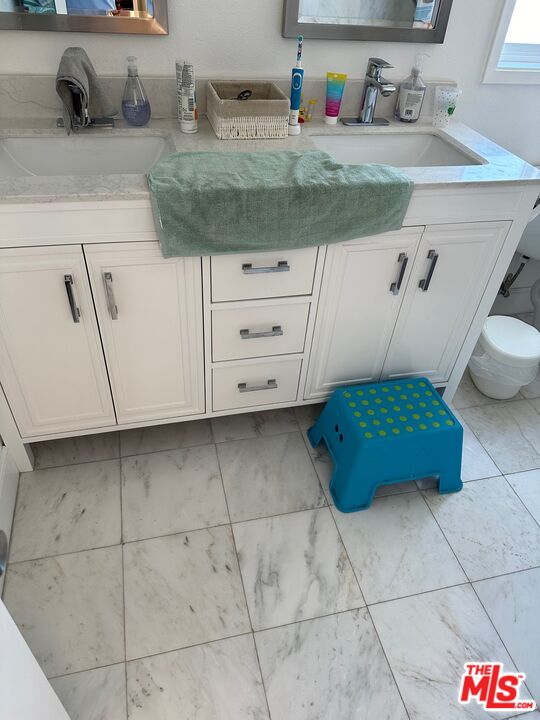 27035 Whitestone Road Rancho Palos Verdes, CA 90275 - Photo 4 of 6 a kitchen with a sink and cabinets