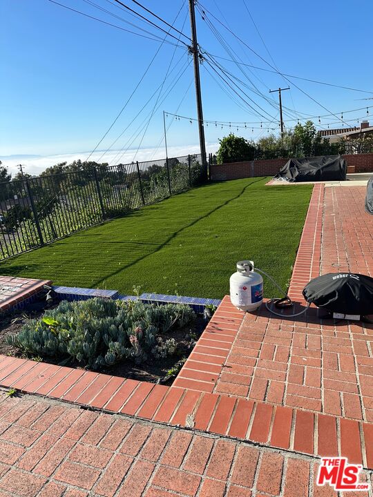 27035 Whitestone Road Rancho Palos Verdes, CA 90275 - Photo 6 of 6 a view of a wooden deck and a yard