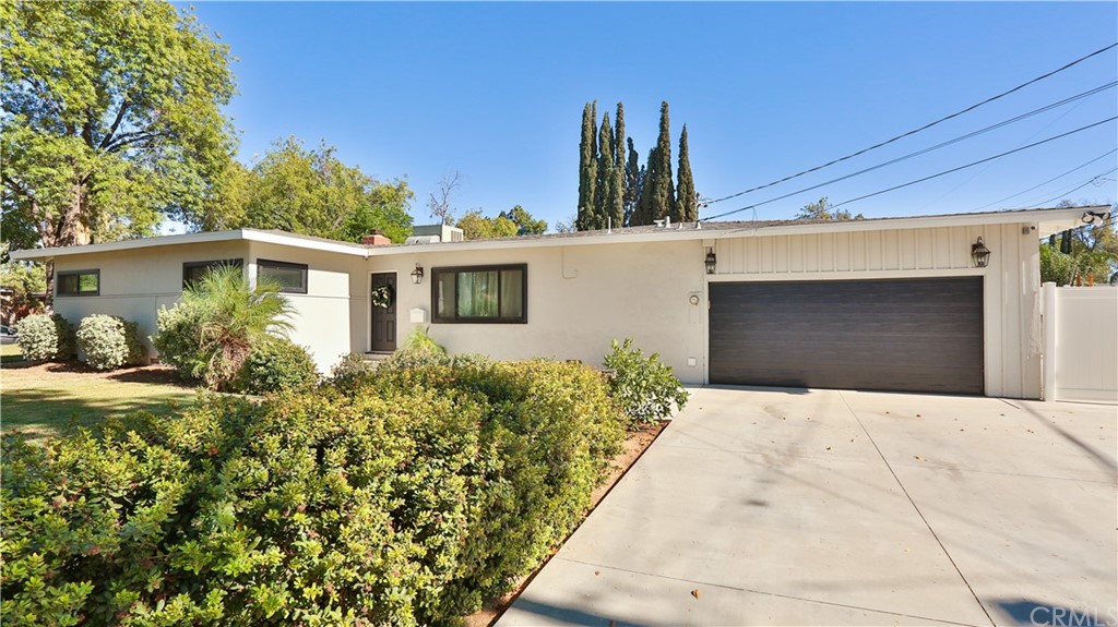 7272 Mt Vernon Street Riverside, CA 92504 - Photo 3 of 33 Front of property with new garage door