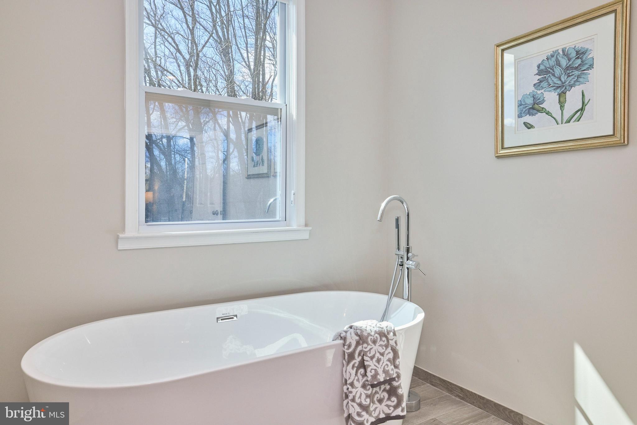 15531 Radwick Lane Silver Spring, MD 20906 - Photo 32 of 56 Primary bathroom boasts large shower & separte tub