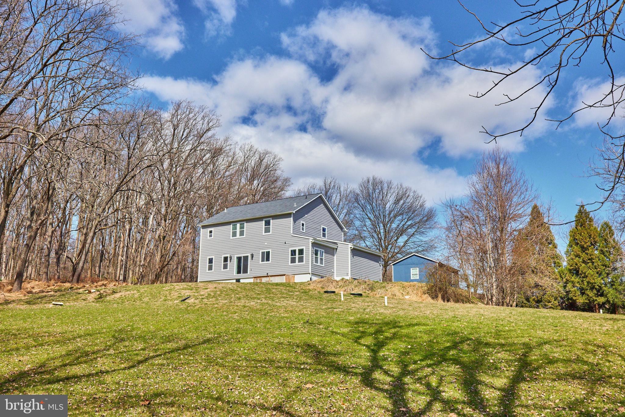 15531 Radwick Lane Silver Spring, MD 20906 - Photo 52 of 56 Imagine, patios, outdoor fireplace, fun gatherings