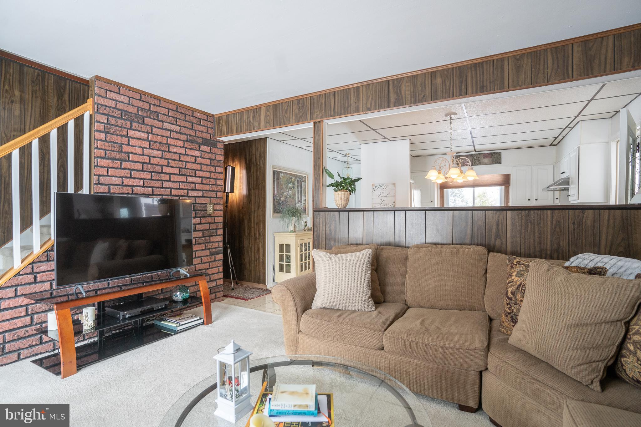 3 Fennimore Road Hamilton, NJ 08690 - Photo 15 of 52 a living room with furniture and a flat screen tv