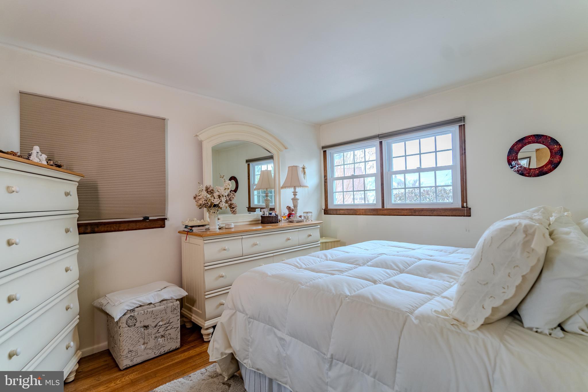 3 Fennimore Road Hamilton, NJ 08690 - Photo 20 of 52 a bedroom with a bed and wooden floor