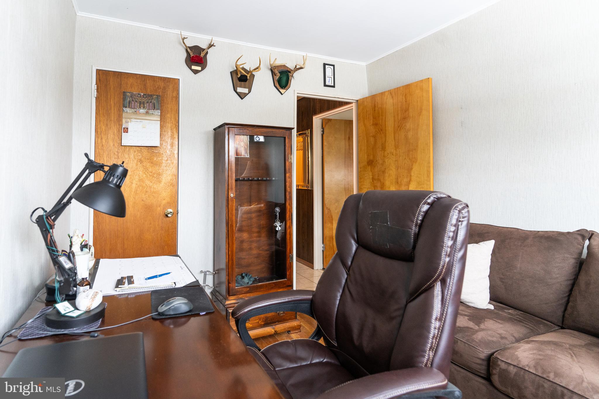 3 Fennimore Road Hamilton, NJ 08690 - Photo 24 of 52 a living room with furniture and a gym machine