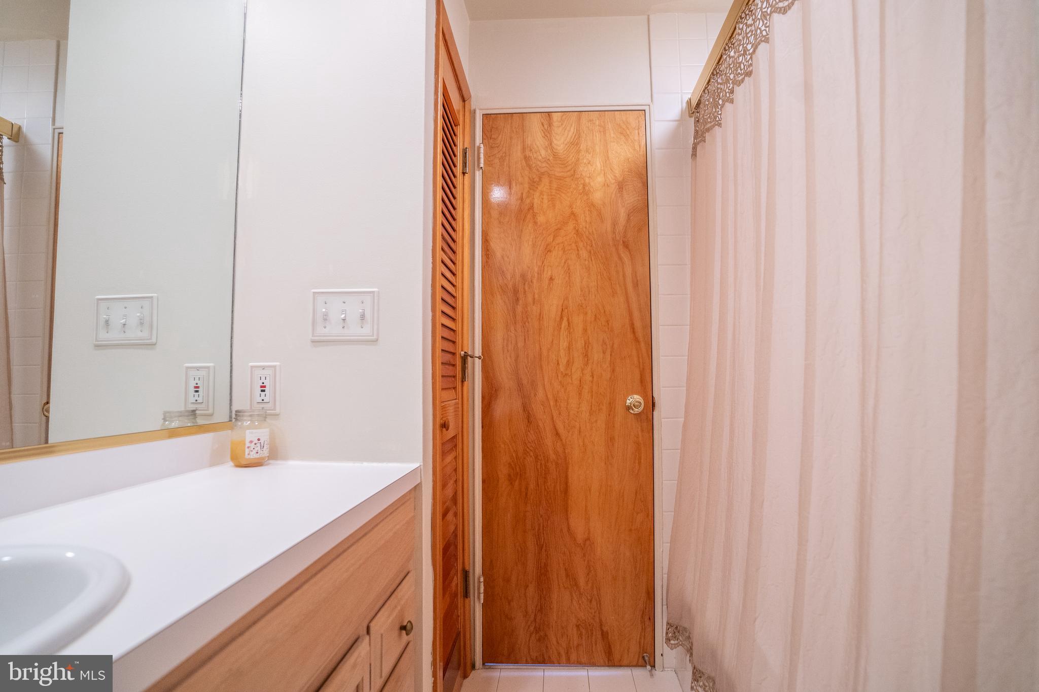 3 Fennimore Road Hamilton, NJ 08690 - Photo 28 of 52 a bathroom with a sink and a mirror