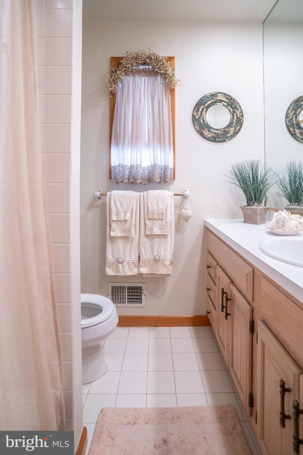 3 Fennimore Road Hamilton, NJ 08690 - Photo 29 of 52 a bathroom with a sink a toilet and a shower