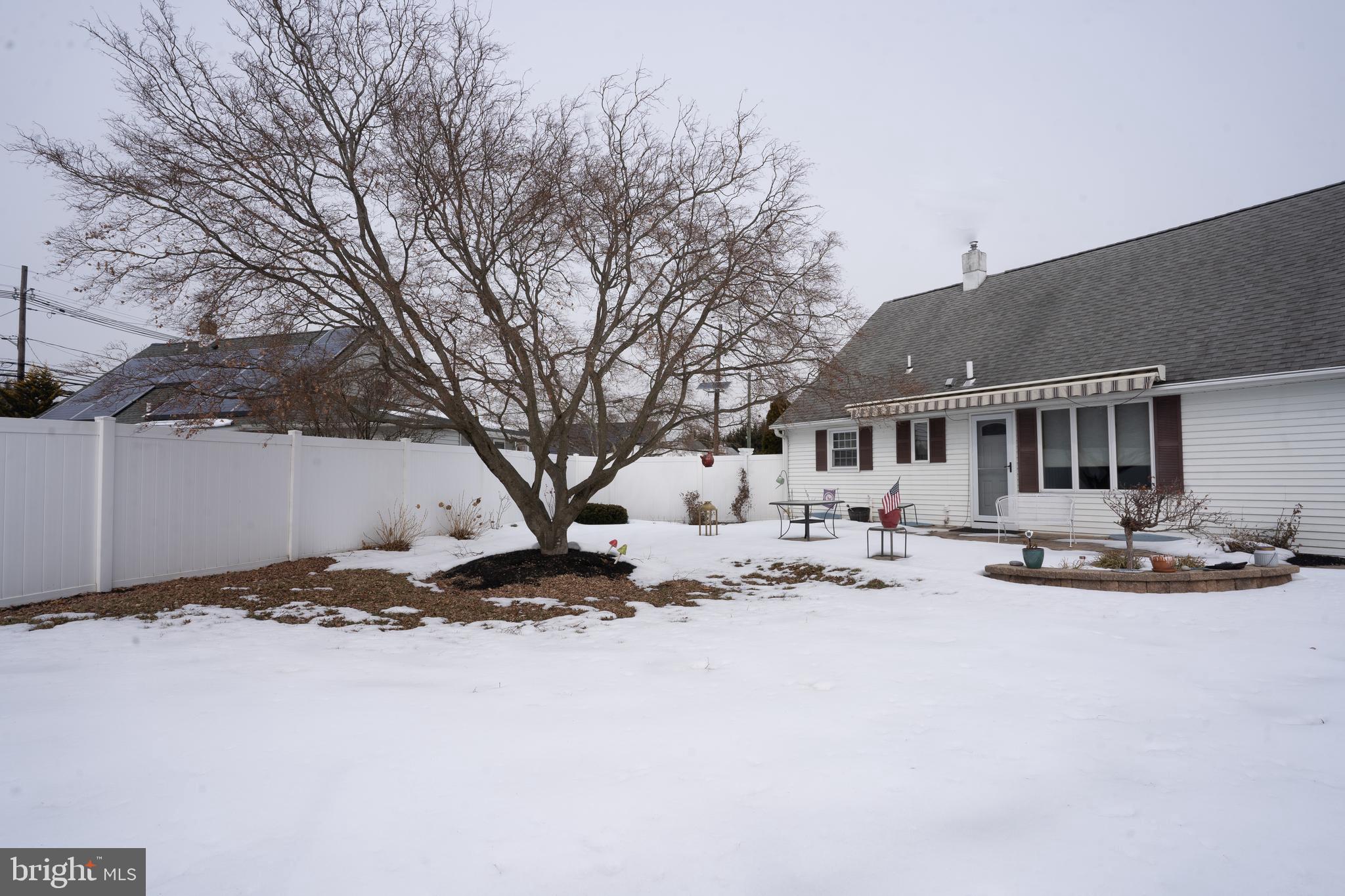 3 Fennimore Road Hamilton, NJ 08690 - Photo 52 of 52 a backyard of a house with fire pit and outdoor seating