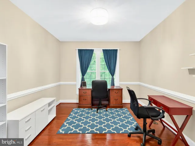 a bedroom with bed and closet