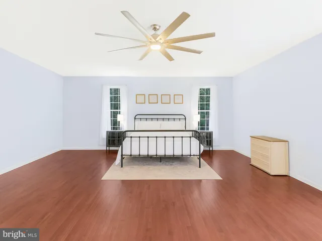 a view of a chair and table in the balcony