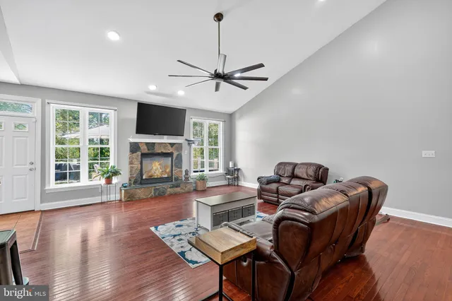 a view of a livingroom with furniture and window