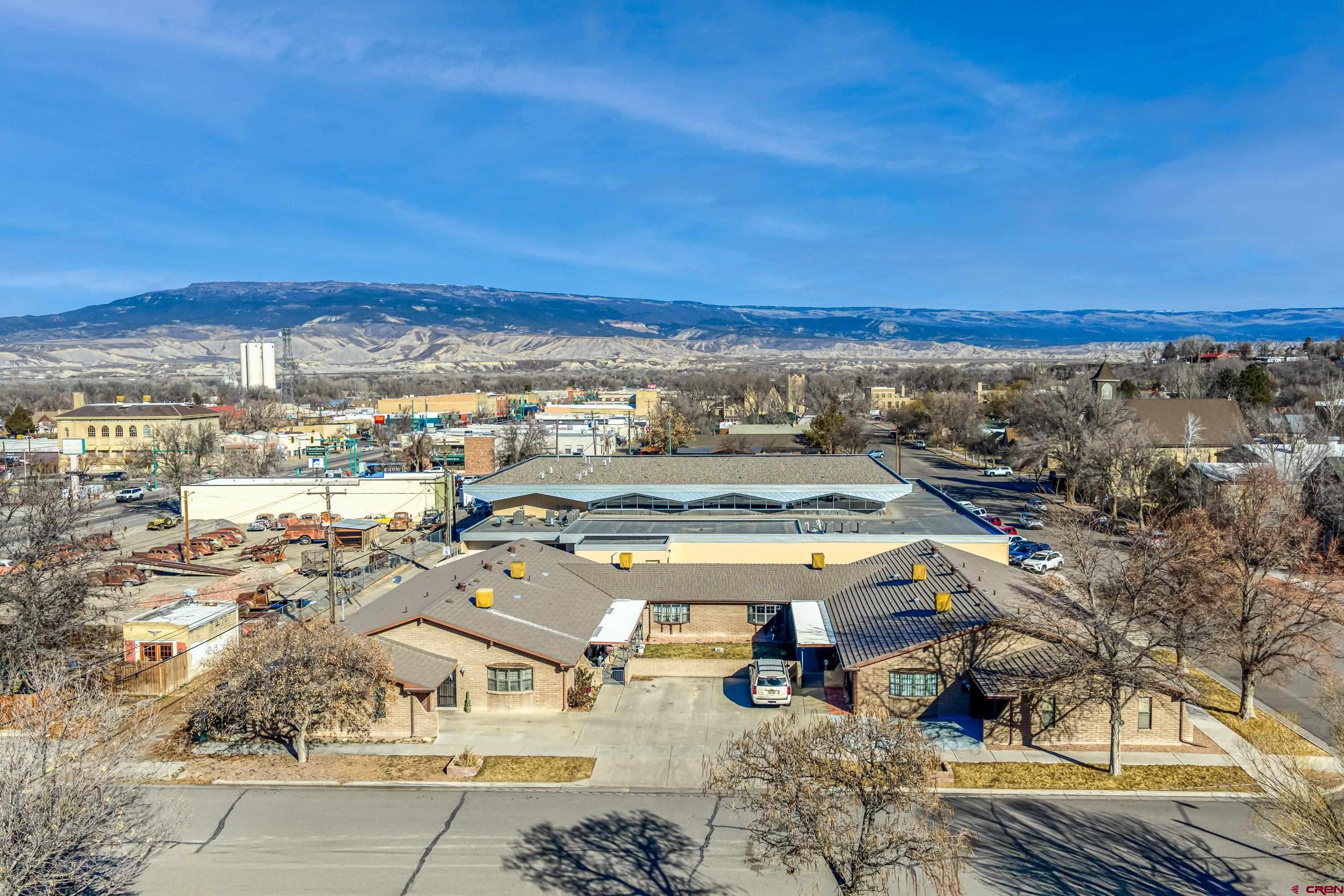 155 East 7th Street Delta, CO 81416 - Photo 18 of 19 an aerial view of residential houses with outdoor space