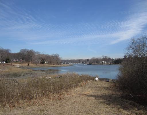16 Juniper Road, Unit 1 Darien, CT 06820 - Photo 1 of 2 a view of lake with mountain