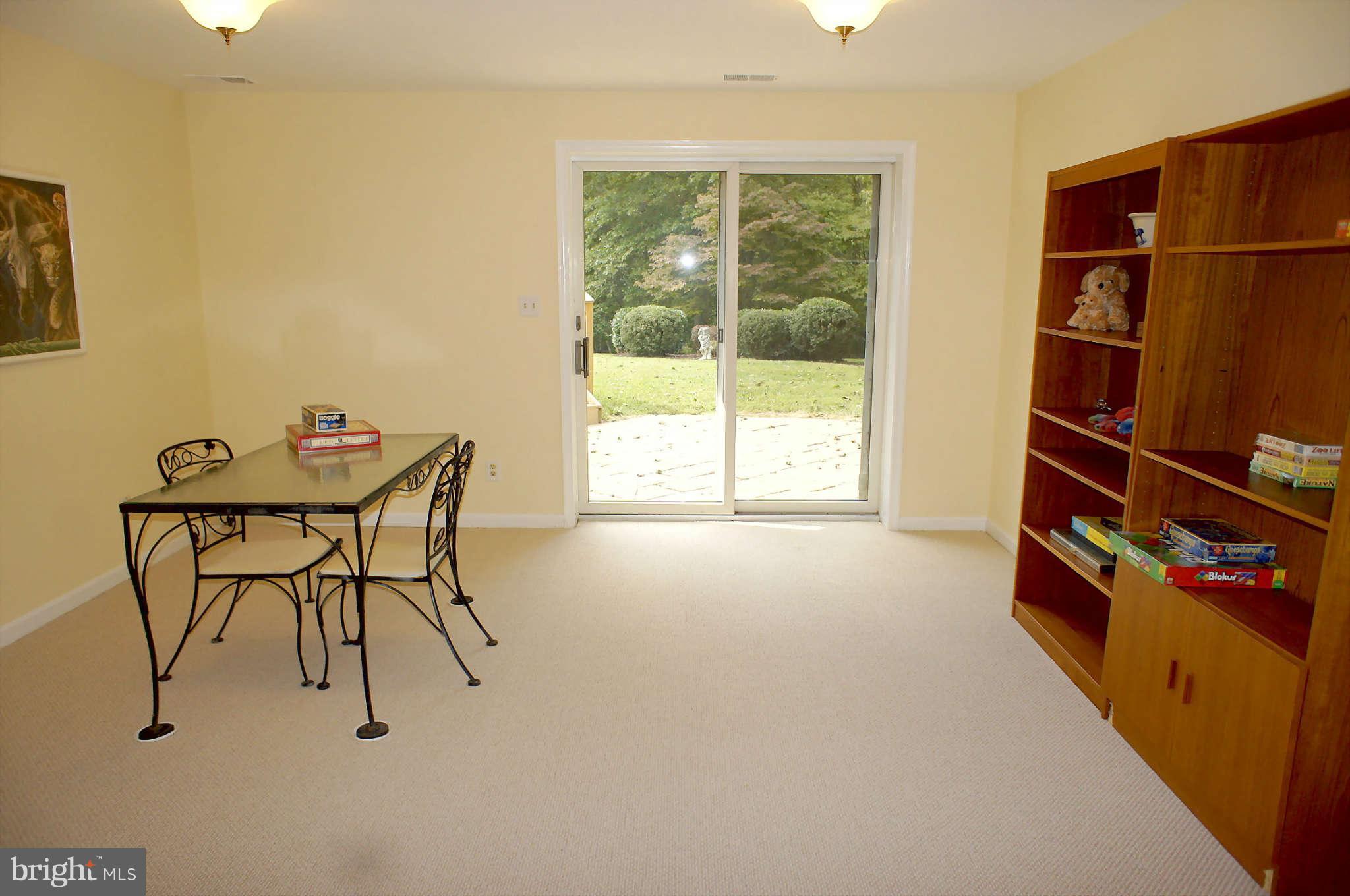 13307 Query Mill Road North Potomac, MD 20878 - Photo 22 of 30 Game Room with Walk-out