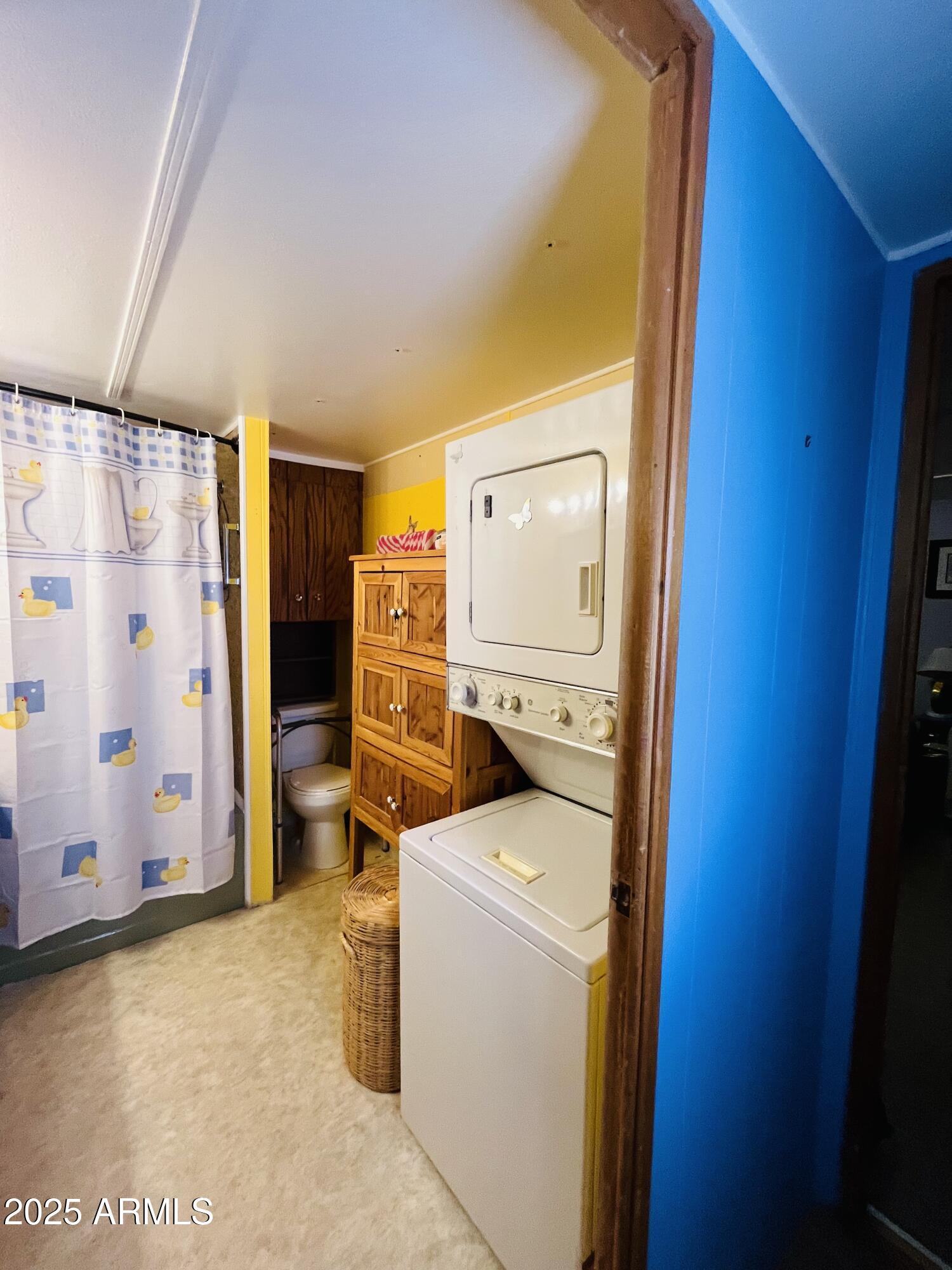 2100 North Trekell Road, Unit 17 Casa Grande, AZ 85122 - Photo 15 of 25 a utility room with dryer and washer