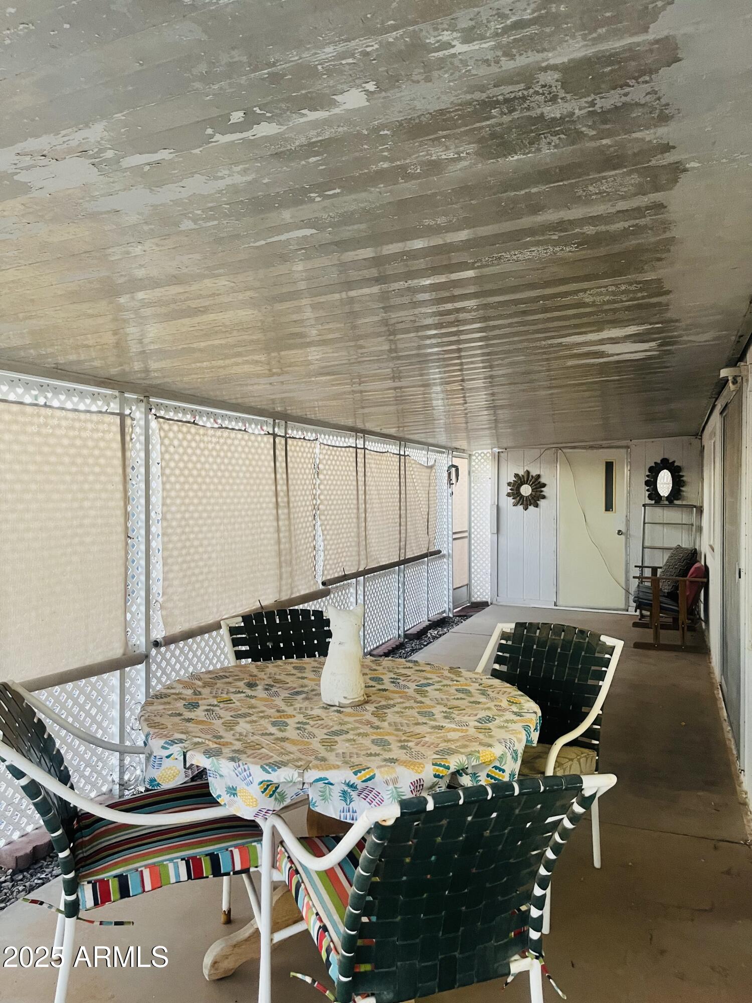 2100 North Trekell Road, Unit 17 Casa Grande, AZ 85122 - Photo 18 of 25 a bedroom with a bed and a table