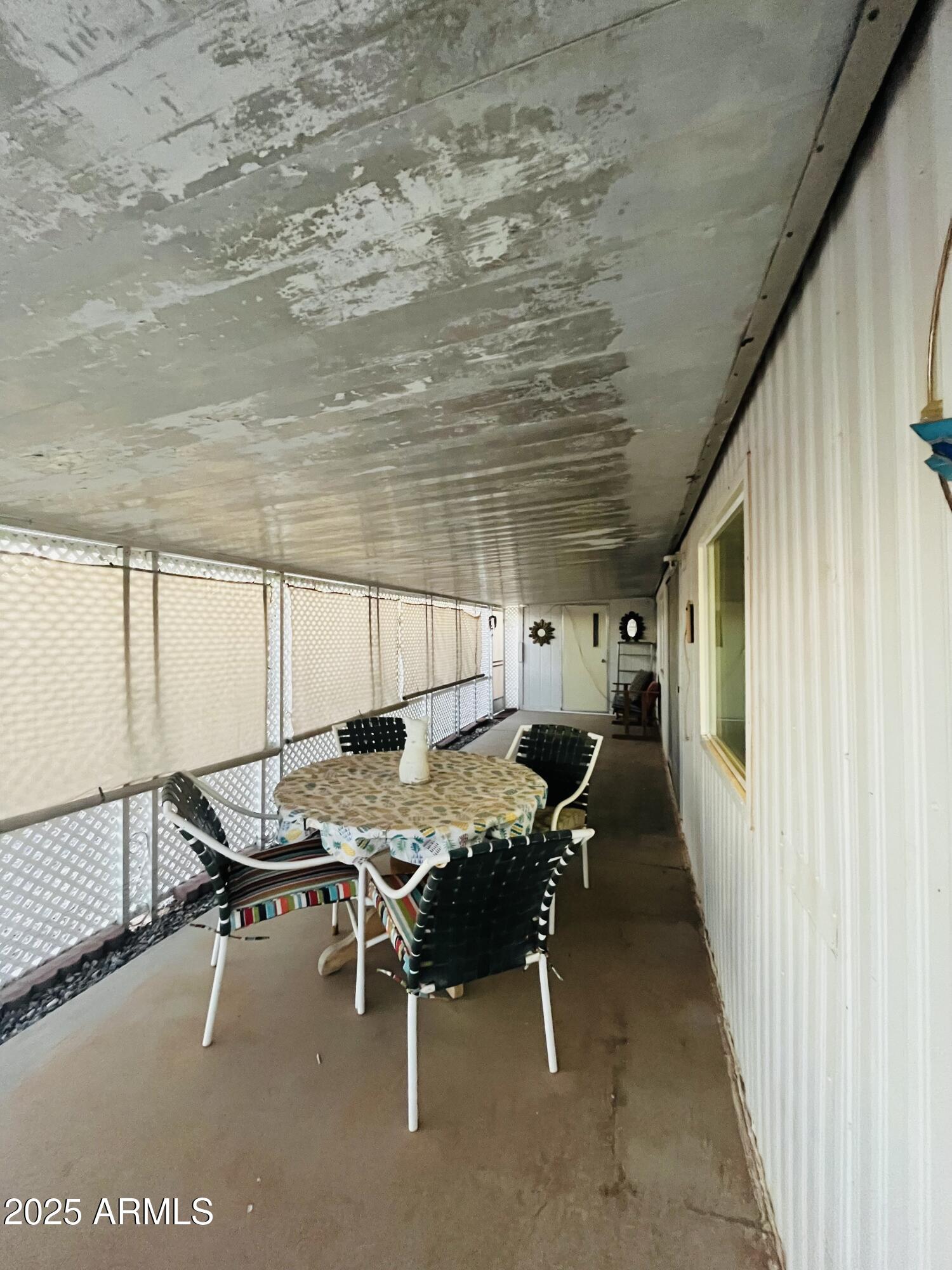 2100 North Trekell Road, Unit 17 Casa Grande, AZ 85122 - Photo 19 of 25 a patio with table and chairs