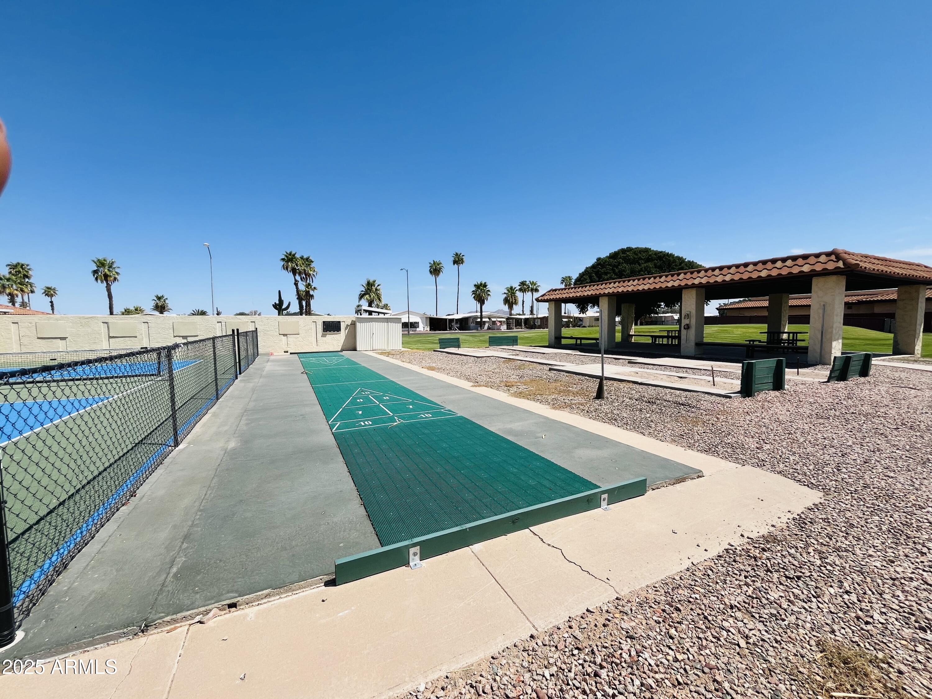 2100 North Trekell Road, Unit 17 Casa Grande, AZ 85122 - Photo 25 of 25 a swimming pool with outdoor seating and yard