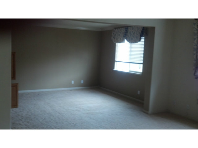 8982 Del Rio Circle Gilroy, CA 95020 - Photo 7 of 16 a open hall with a window