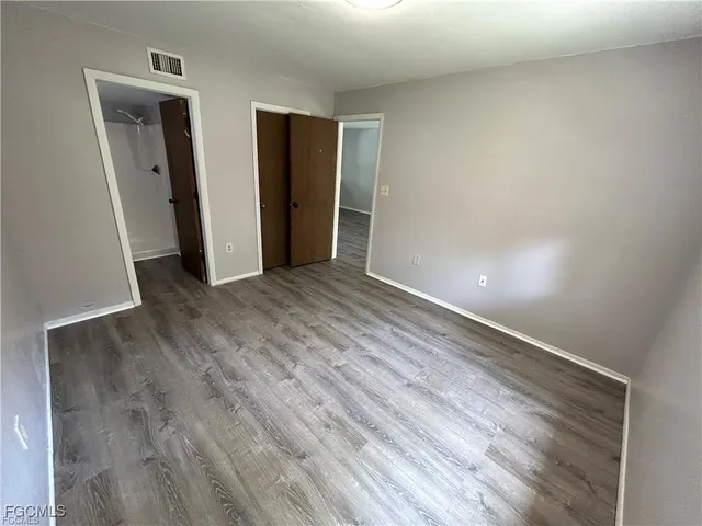 an empty room with closet