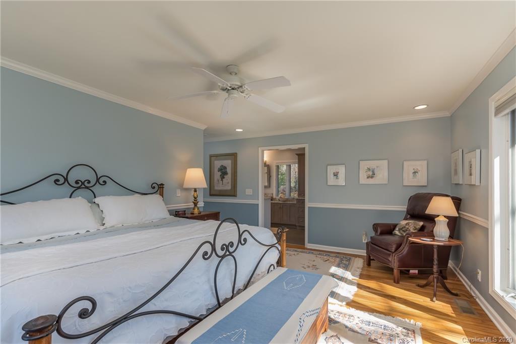 401 Laurel Ridge Road Columbus, NC 28722 - Photo 22 of 37 a bedroom with furniture and a window