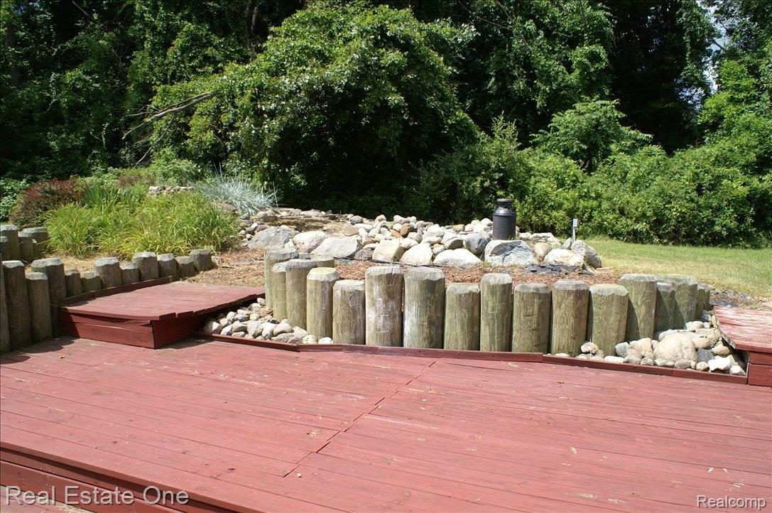 1955 White Lake Road Highland, MI 48356 - Photo 19 of 25 DECK POND WATERFALL