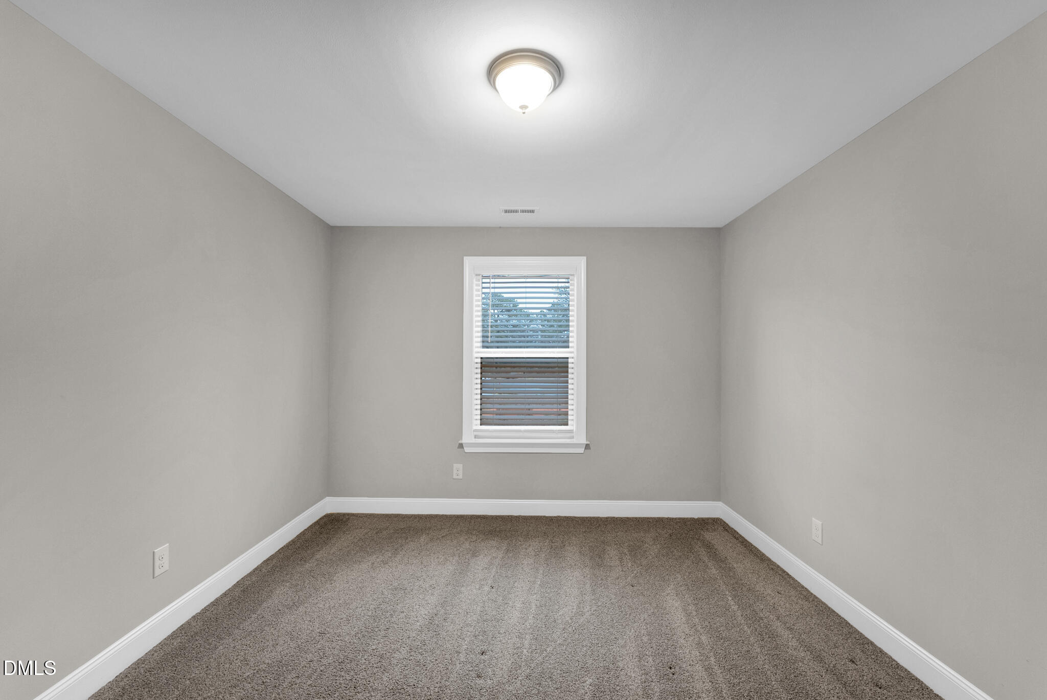 928 Barringer Drive Raleigh, NC 27606 - Photo 21 of 40 a view of a room that has a window