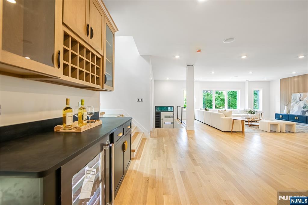 429 Riverside Avenue Rutherford, NJ 07070 - Photo 11 of 32 a view of a living room and kitchen