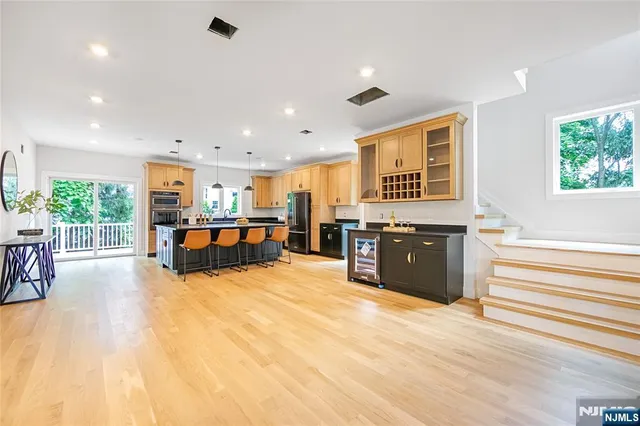 a large room with furniture and a large window