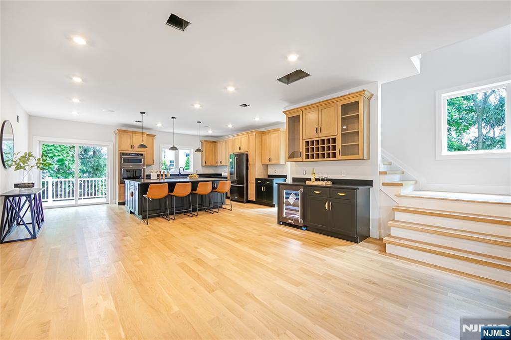 429 Riverside Avenue Rutherford, NJ 07070 - Photo 13 of 32 a large room with furniture and a large window