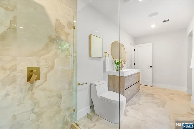a view of living room filled with furniture and window