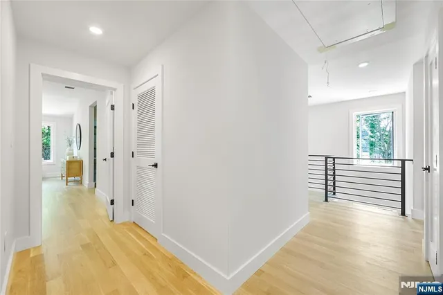 wooden floor in a hall with an entryway