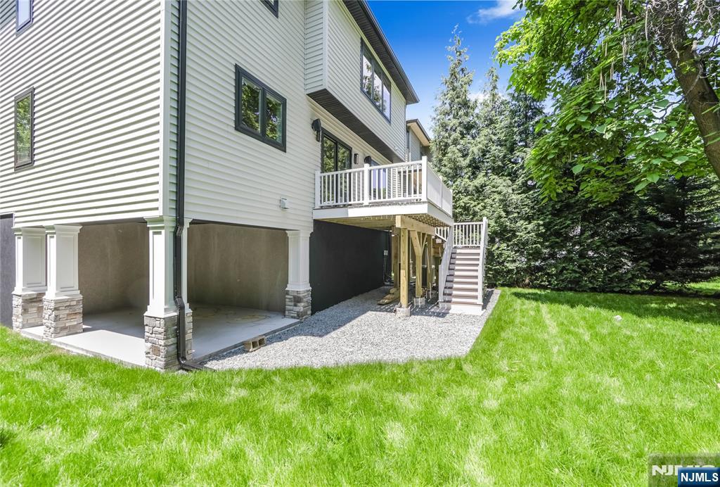 429 Riverside Avenue Rutherford, NJ 07070 - Photo 29 of 32 a view of an house with backyard and a tree