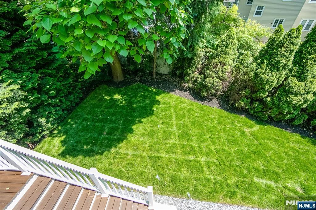 429 Riverside Avenue Rutherford, NJ 07070 - Photo 30 of 32 a view of a garden from a balcony