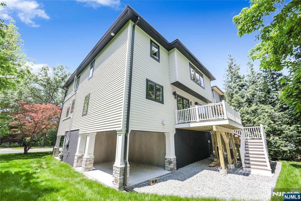429 Riverside Avenue Rutherford, NJ 07070 - Photo 32 of 32 a front view of a house with a yard