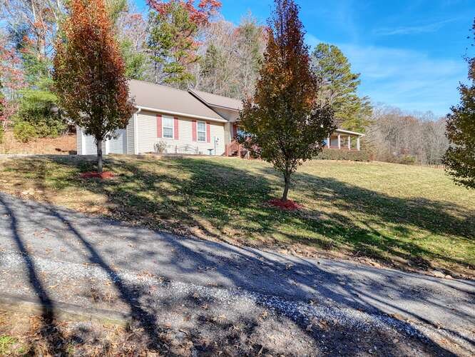 756 Doc Jones Road Blairsville, GA 30512 - Photo 15 of 46 a view of a house with a yard