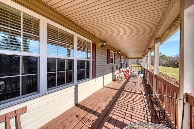 756 Doc Jones Road Blairsville, GA 30512 - Photo 17 of 46 a view of a balcony with wooden floor