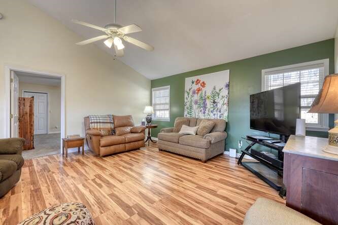 756 Doc Jones Road Blairsville, GA 30512 - Photo 22 of 46 a living room with furniture and a flat screen tv