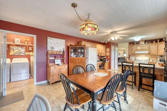 756 Doc Jones Road Blairsville, GA 30512 - Photo 30 of 46 a view of a dining room with furniture window and wooden floor