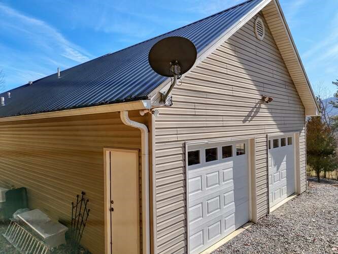 756 Doc Jones Road Blairsville, GA 30512 - Photo 41 of 46 a view of a house with a balcony and furniture