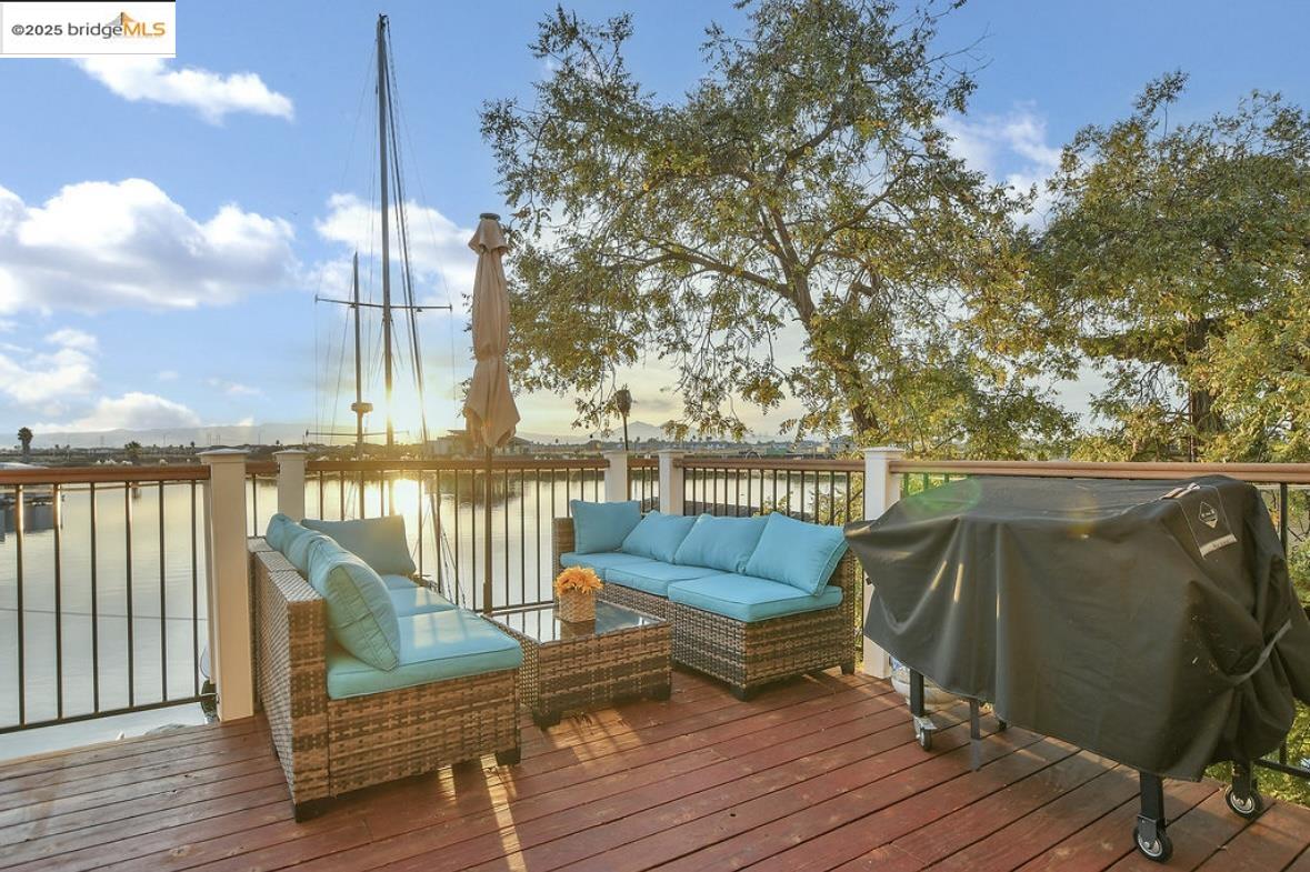 4930 Discovery Point Discovery Bay, CA 94505 - Photo 22 of 30 a view of a deck with couches and wooden floor