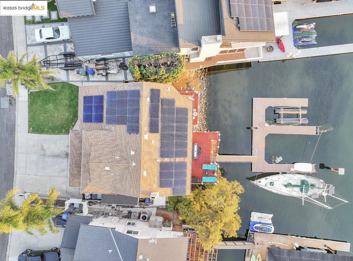 4930 Discovery Point Discovery Bay, CA 94505 - Photo 28 of 30 a view of a patio with table and chairs and potted plants