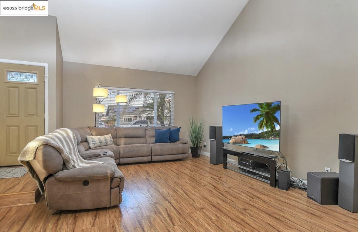 4930 Discovery Point Discovery Bay, CA 94505 - Photo 6 of 30 a living room with furniture and a wooden floor