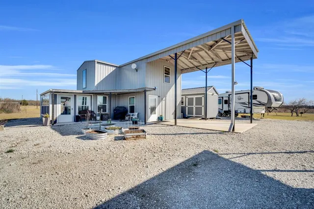 a view of a house with sink and sitting area
